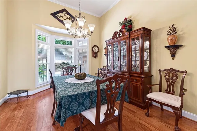 a bathroom with double vanity sinks and a mirror