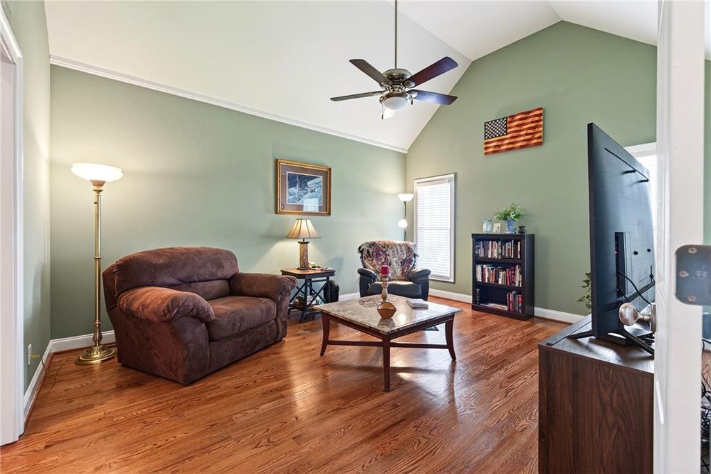 865 Laurel Ridge Road Cleveland, GA 30528 - Photo 29 of 81 a living room with furniture and a flat screen tv