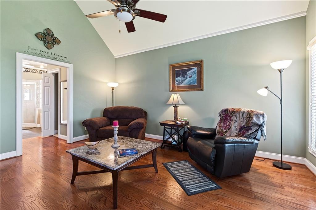 865 Laurel Ridge Road Cleveland, GA 30528 - Photo 30 of 81 a living room with furniture and a wooden floor