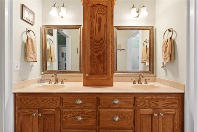 a kitchen with stainless steel appliances granite countertop a refrigerator and wooden floor