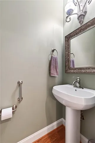 a aerial view of a house with a yard basket ball court and outdoor seating