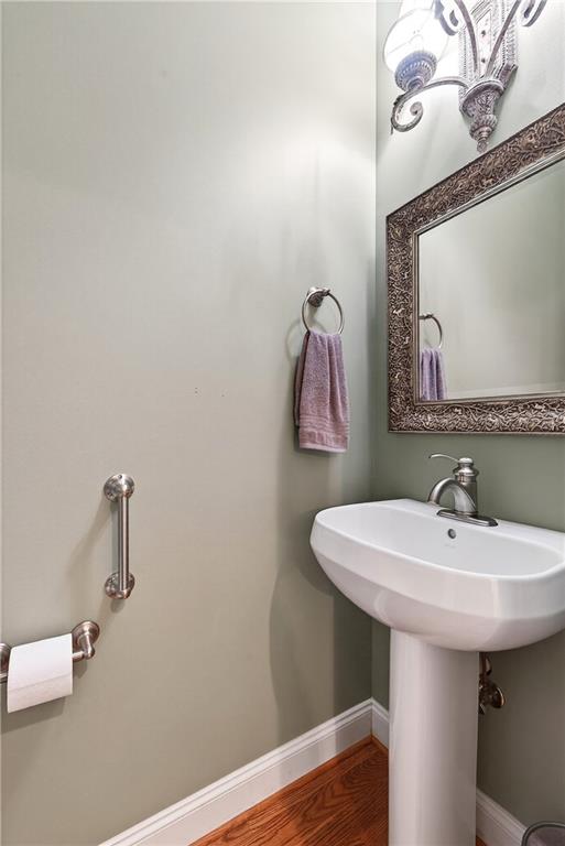 865 Laurel Ridge Road Cleveland, GA 30528 - Photo 41 of 81 a bathroom with a sink and a mirror