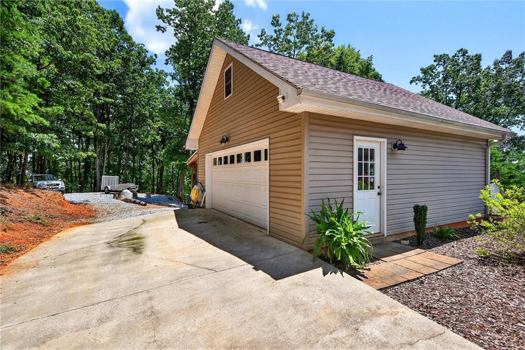 865 Laurel Ridge Road Cleveland, GA 30528 - Photo 44 of 81 a view of a house with a yard