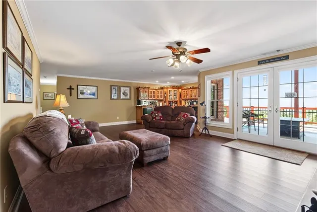 a view of a balcony with wooden floor and outdoor space