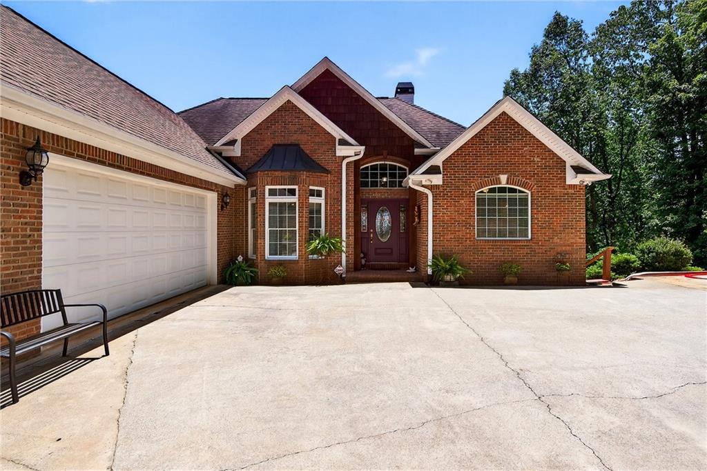 865 Laurel Ridge Road Cleveland, GA 30528 - Photo 5 of 81 a front view of a house with yard