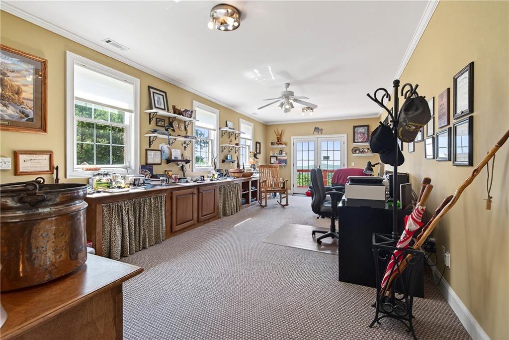 865 Laurel Ridge Road Cleveland, GA 30528 - Photo 57 of 81 a view of a workspace with furniture and a window