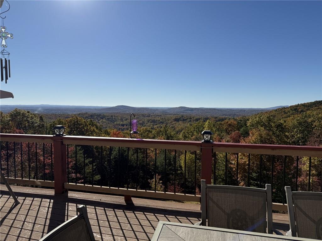 865 Laurel Ridge Road Cleveland, GA 30528 - Photo 81 of 81 a view of a balcony with wooden floor and outdoor space