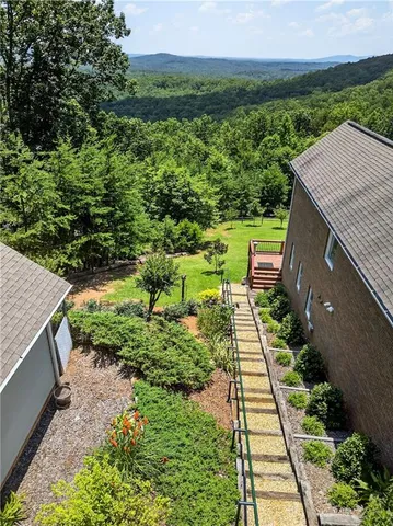 a living room with a fireplace and cabinets
