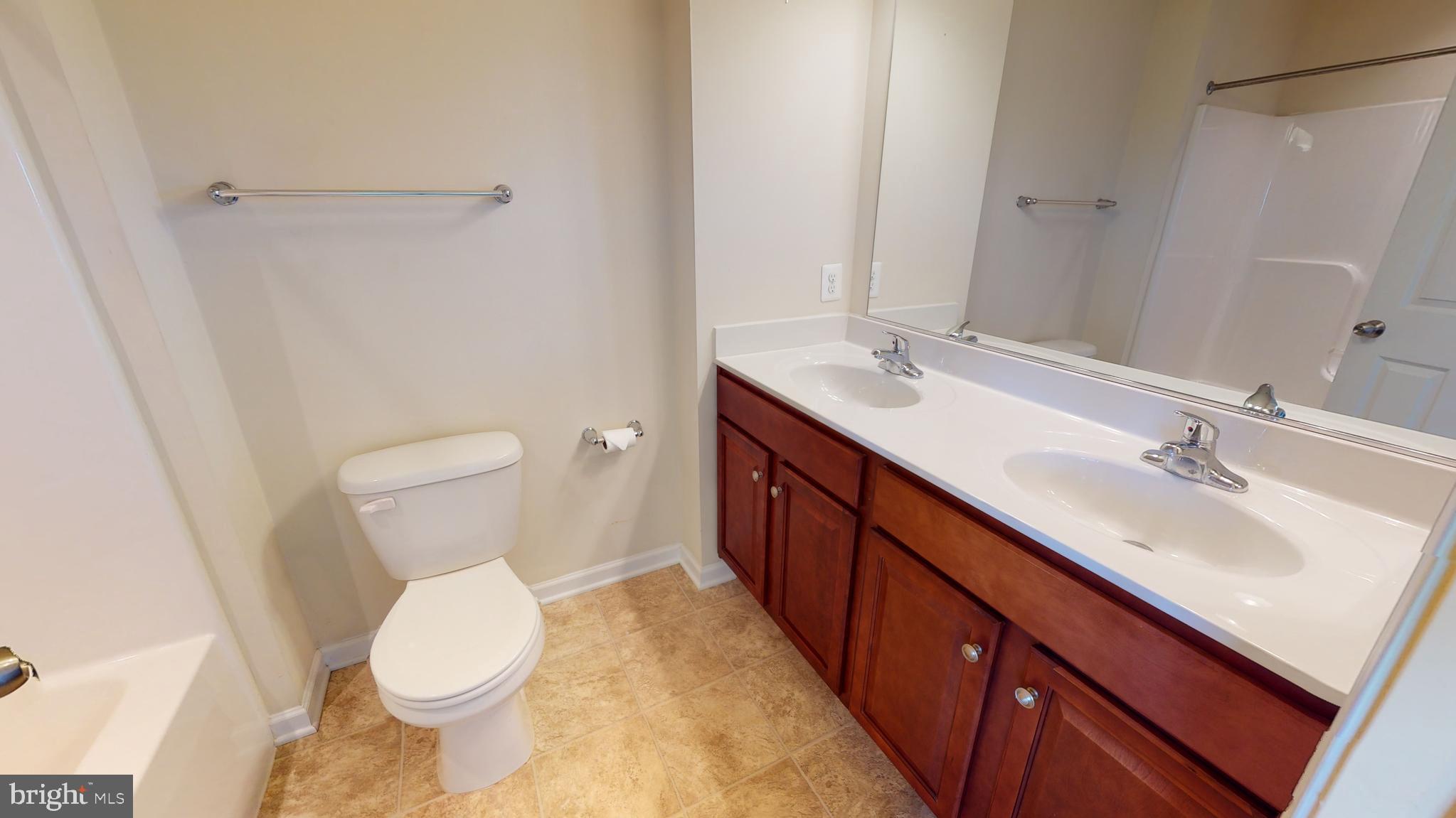 1141 Mare Street Ranson, WV 25438 - Photo 14 of 21 a bathroom with a sink toilet and shower