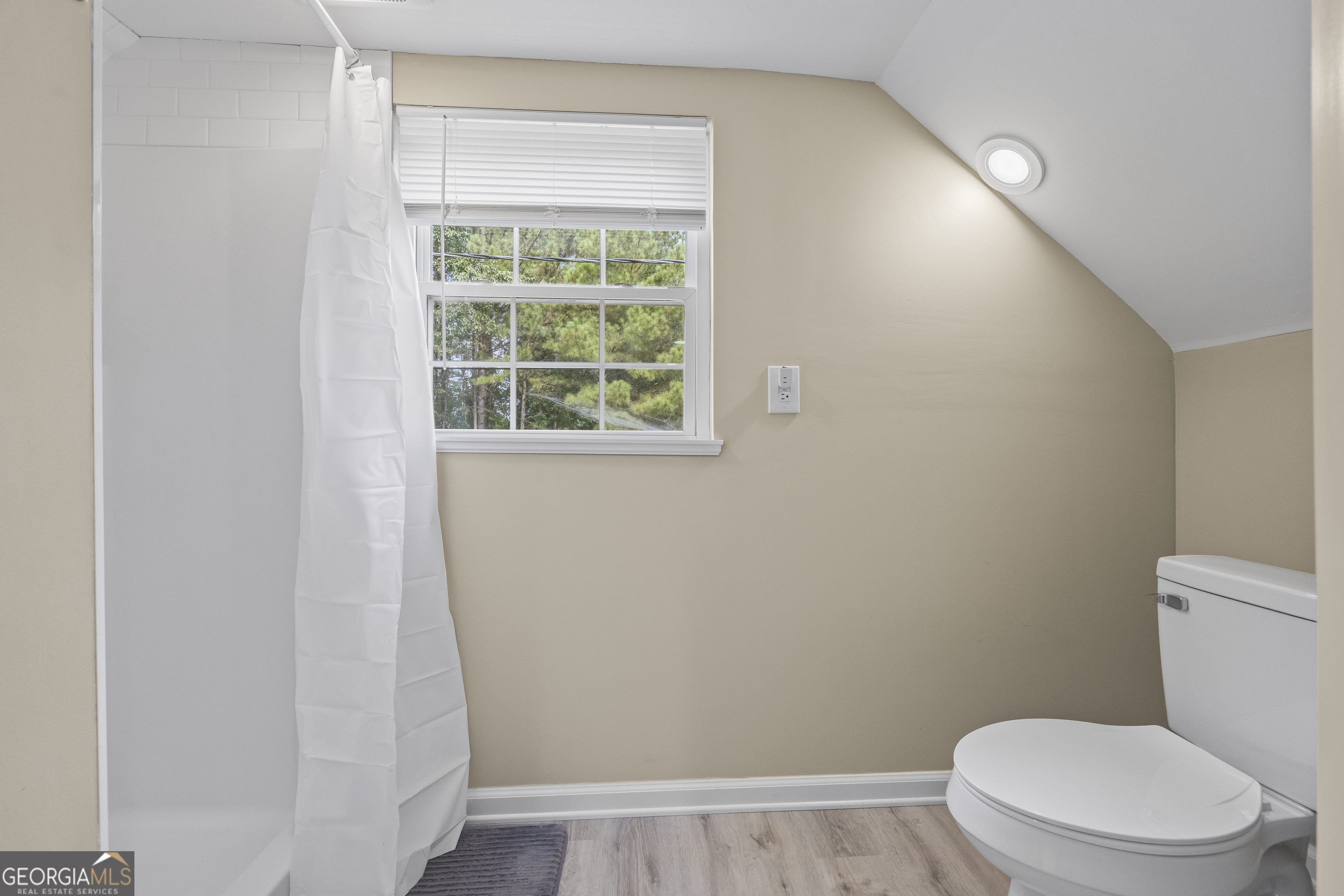 22 Anderson Thomas Road Martin, GA 30557 - Photo 101 of 110 a white toilet sitting next to a window