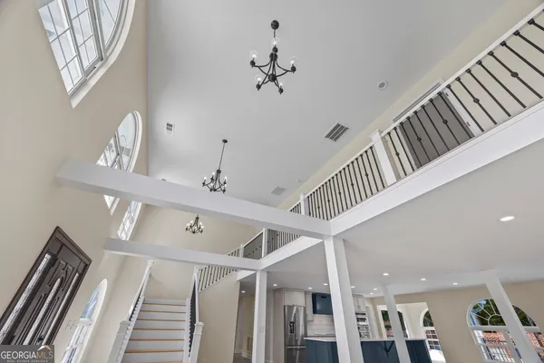 a stove top oven sitting inside of a kitchen