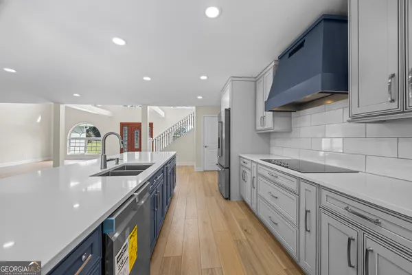 a view of a kitchen with furniture and window