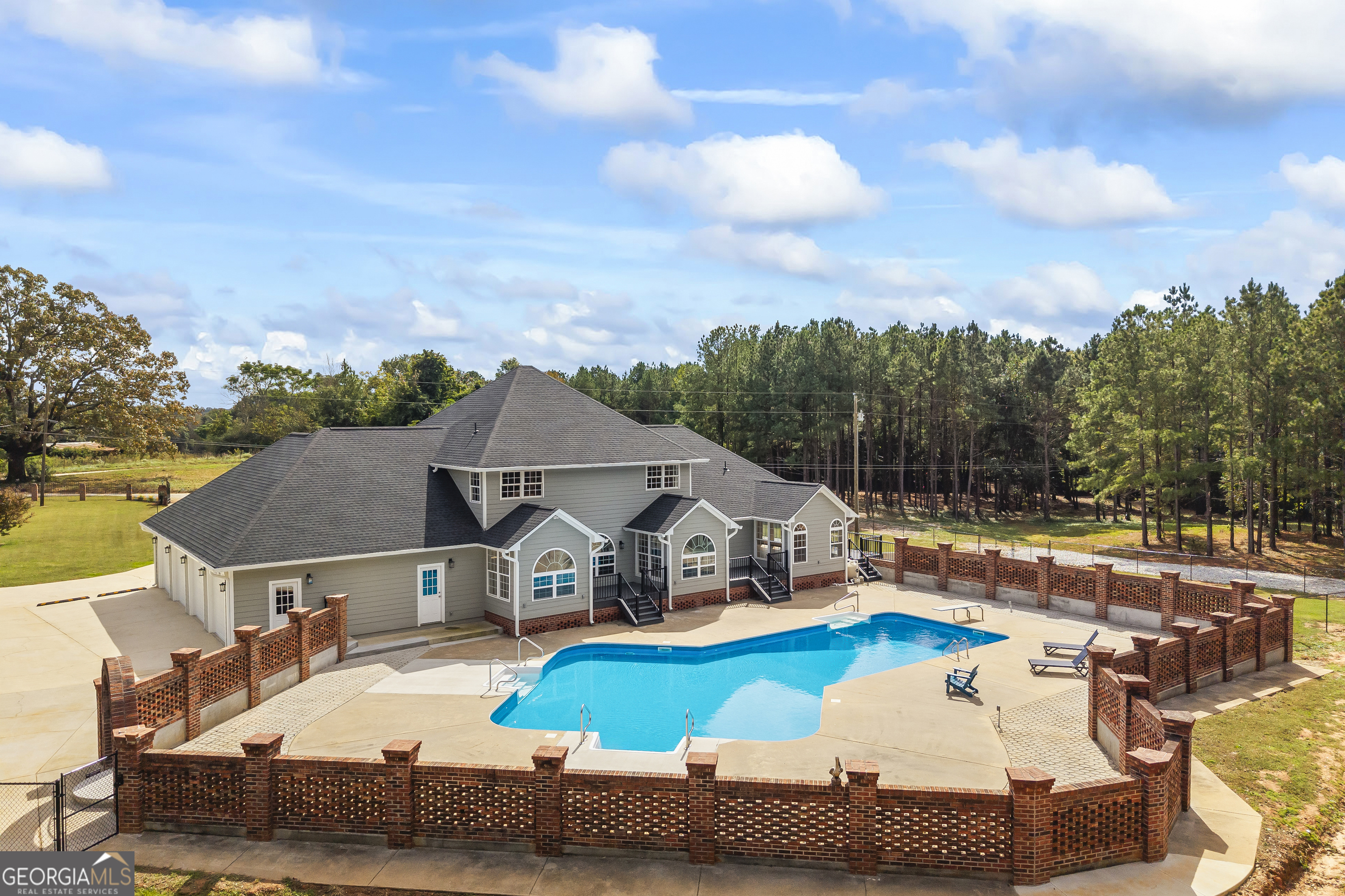 22 Anderson Thomas Road Martin, GA 30557 - Photo 3 of 110 an aerial view of a house with swimming pool and large trees