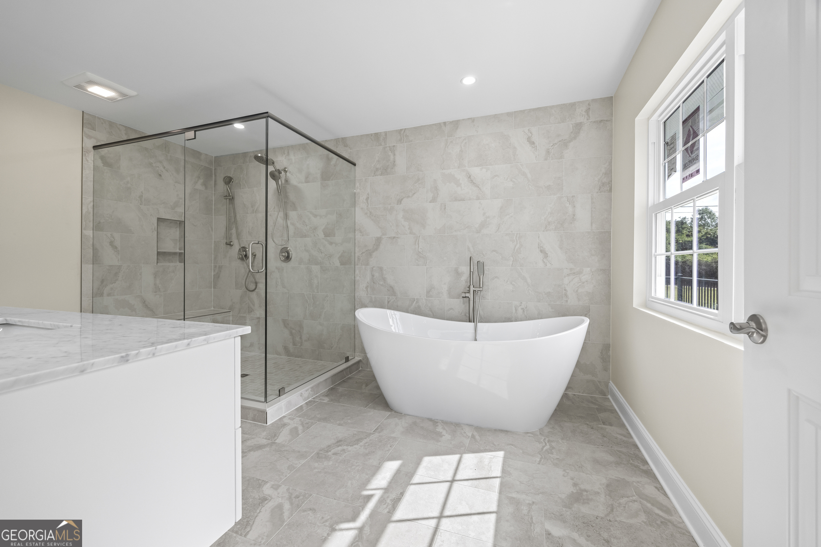 22 Anderson Thomas Road Martin, GA 30557 - Photo 44 of 110 a bathroom with a bathtub and a shower