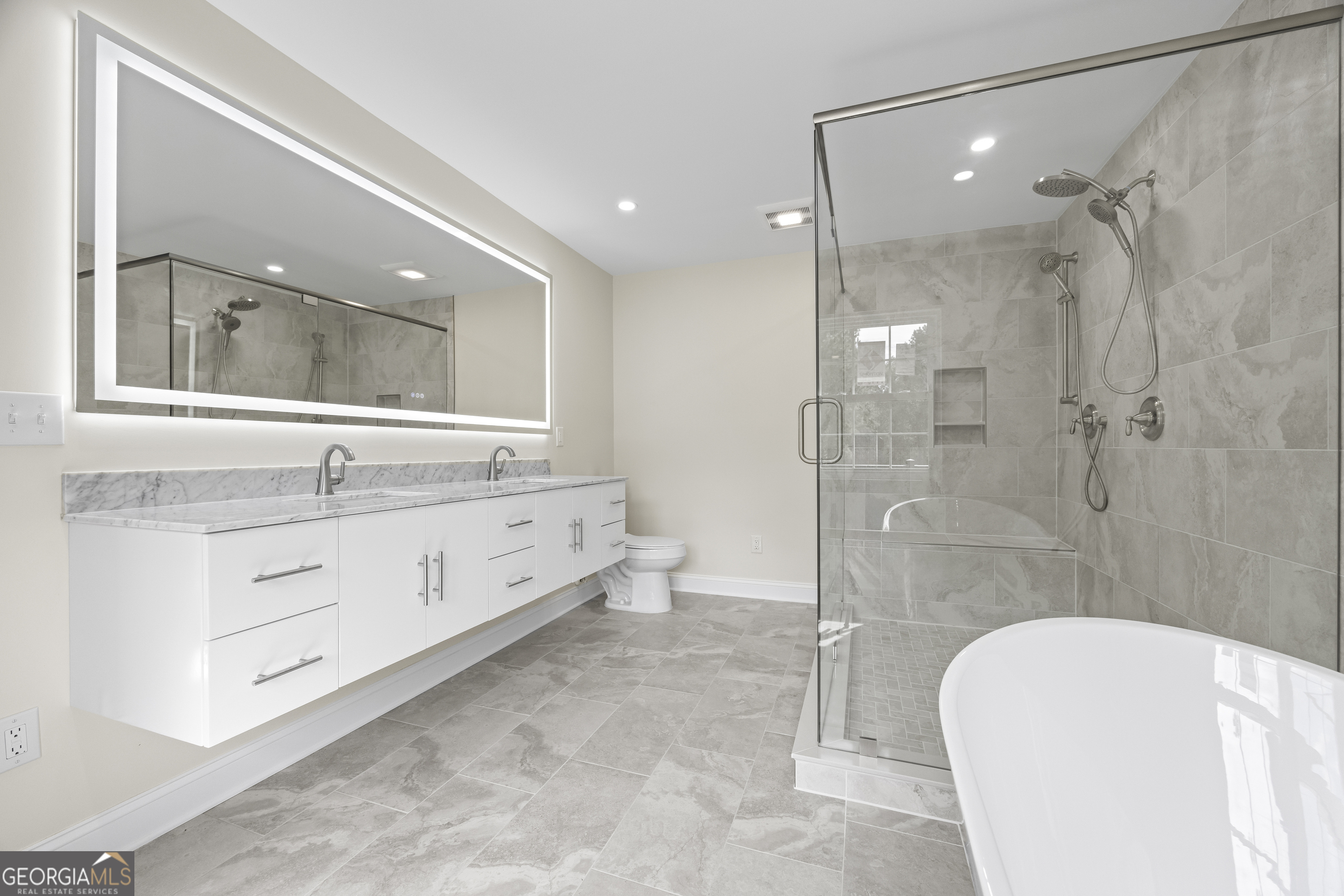 22 Anderson Thomas Road Martin, GA 30557 - Photo 45 of 110 a bathroom with a double vanity sink toilet and shower