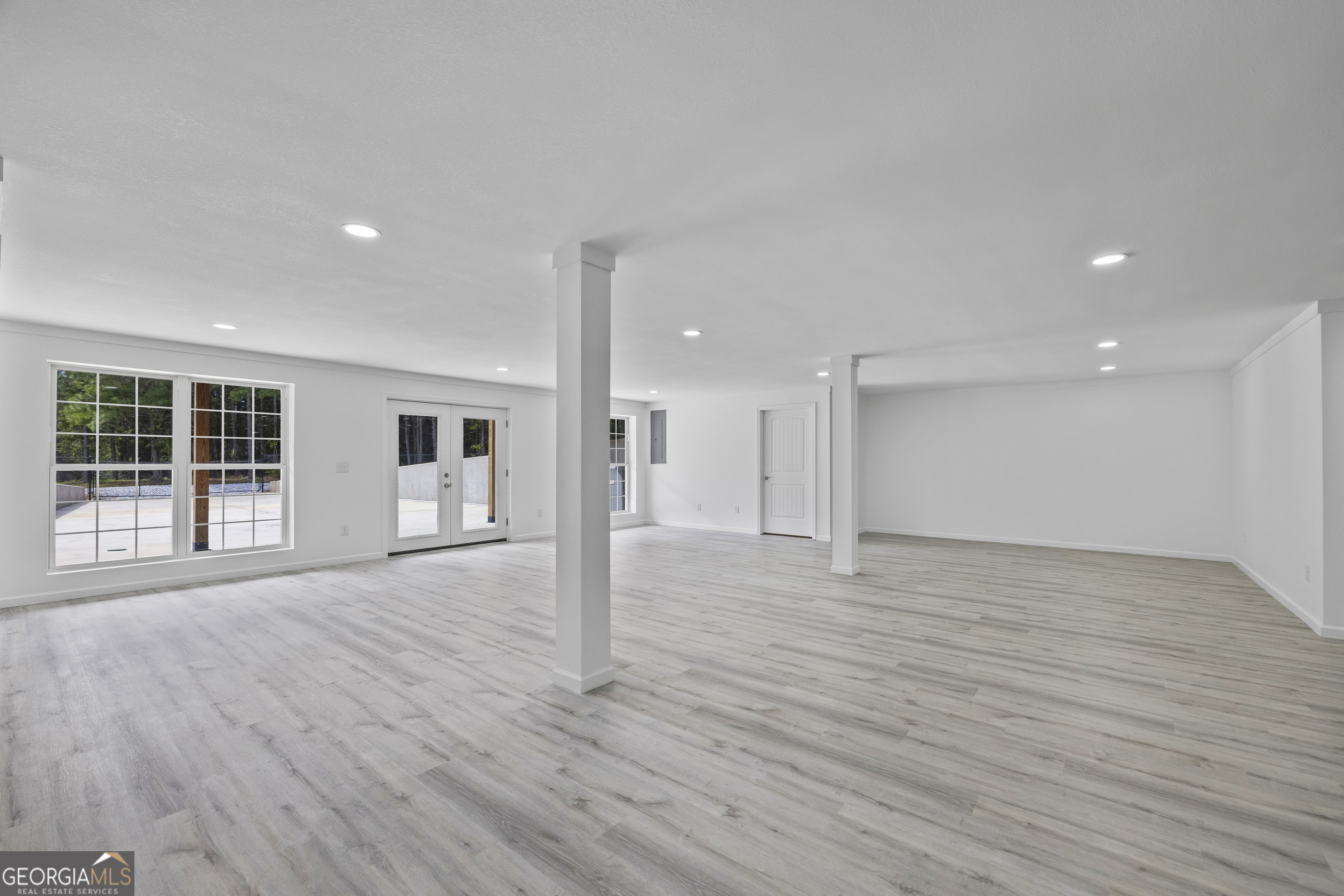 22 Anderson Thomas Road Martin, GA 30557 - Photo 83 of 110 a view of an empty room with wooden floor and windows