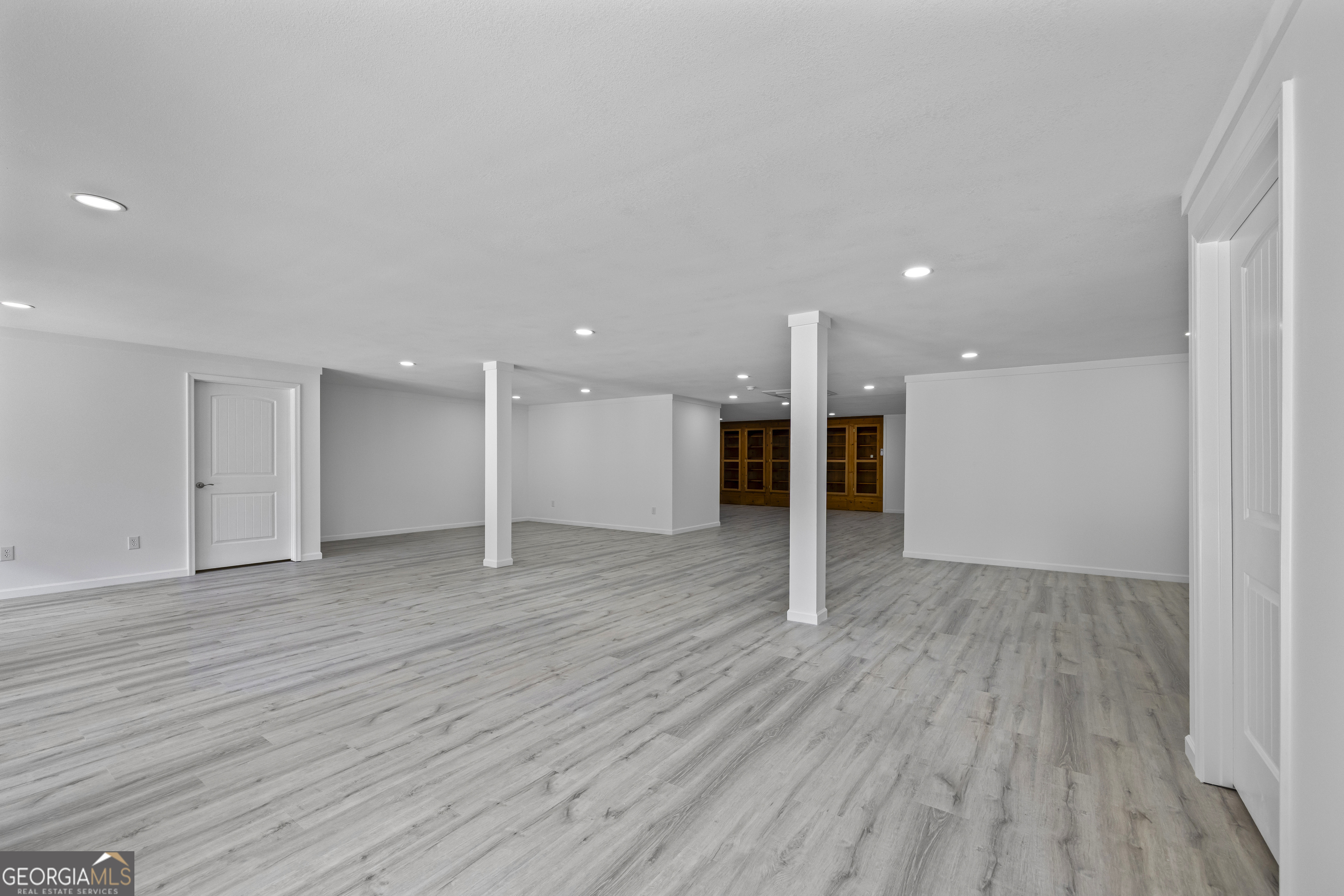 22 Anderson Thomas Road Martin, GA 30557 - Photo 84 of 110 a view of an empty room with wooden floor