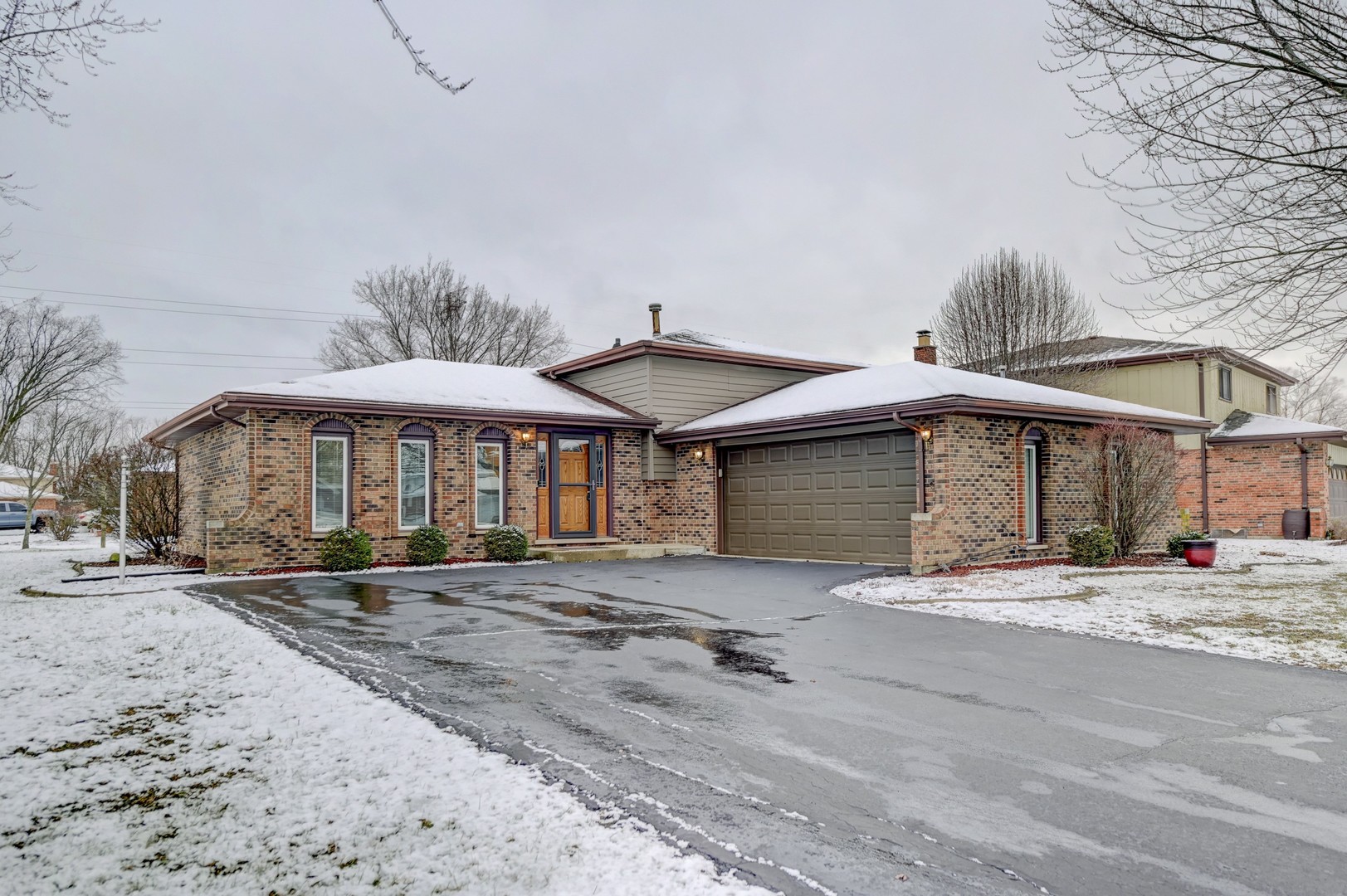 3484 Gilbert Court Crete, IL 60417 - Photo 18 of 18 a front view of a house with a yard and garage