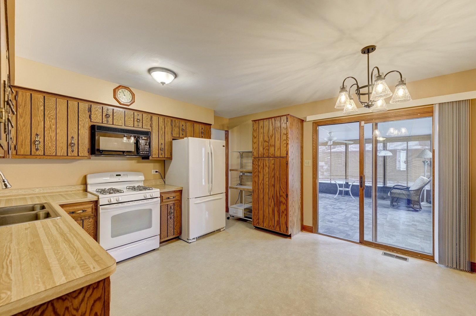 3484 Gilbert Court Crete, IL 60417 - Photo 3 of 18 a kitchen with stainless steel appliances granite countertop a refrigerator stove and sink