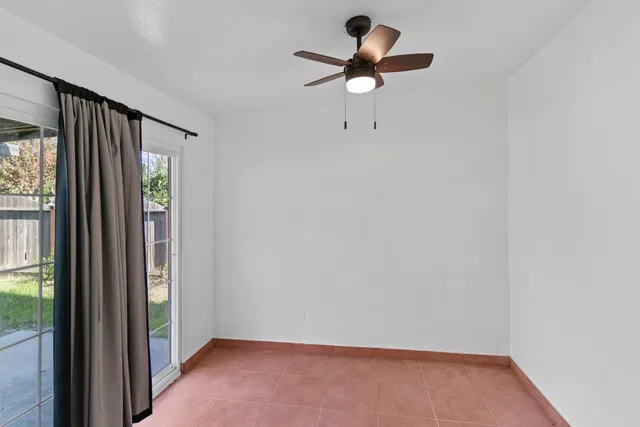 a view of yard with swimming pool and green space