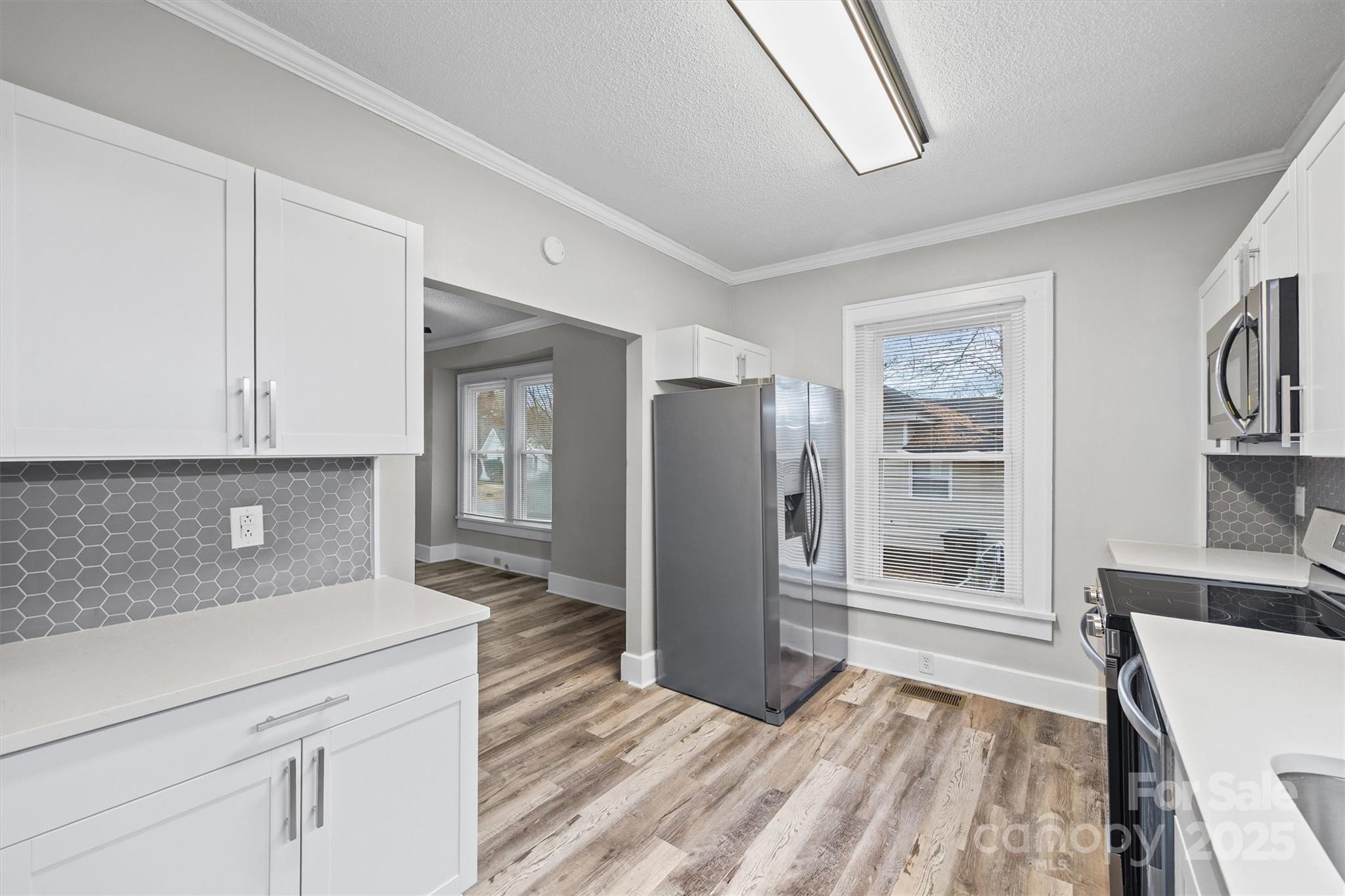 548 Flint Street Rock Hill, SC 29730 - Photo 12 of 28 a view of kitchen with furniture and window