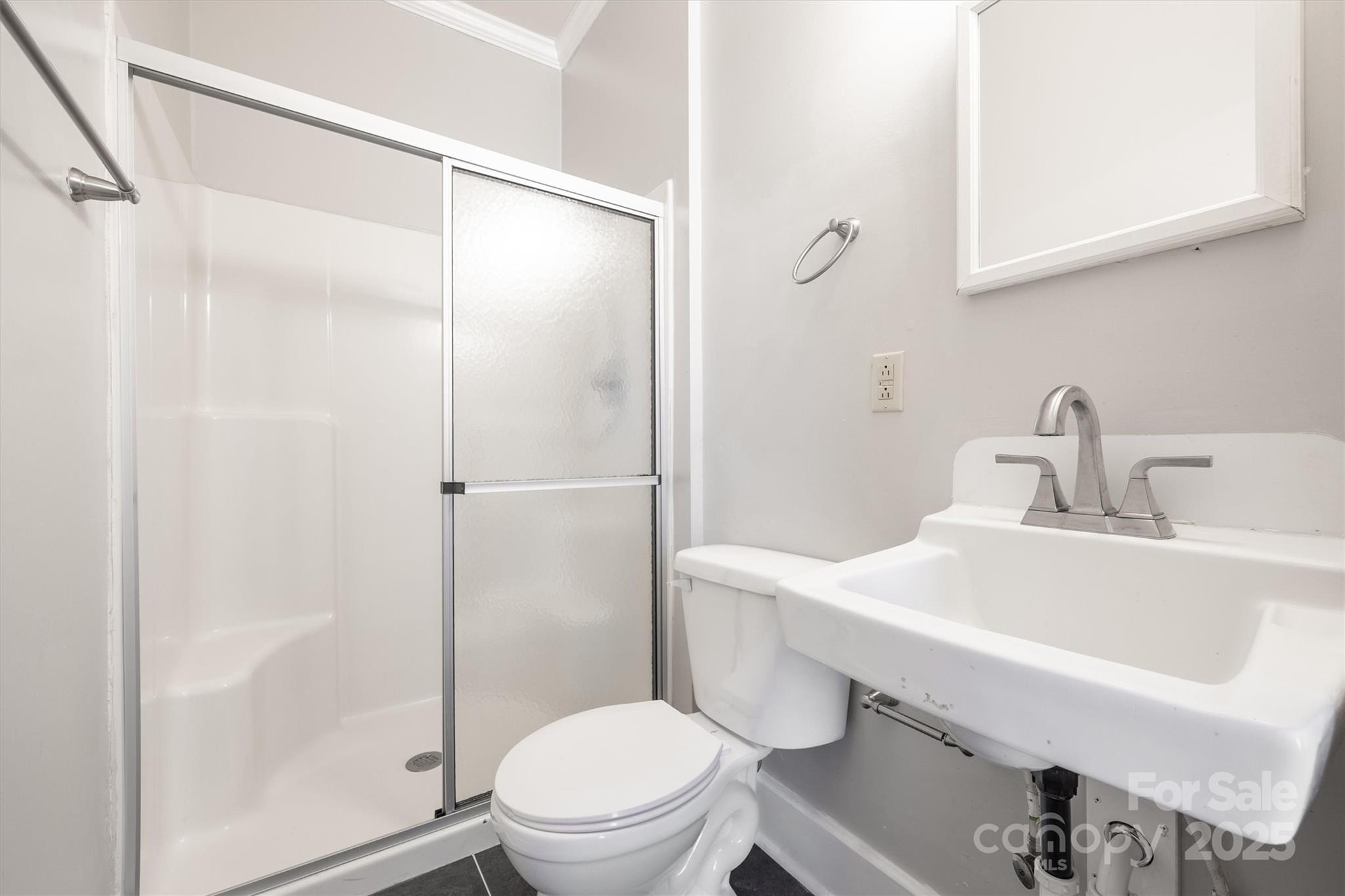 548 Flint Street Rock Hill, SC 29730 - Photo 17 of 28 a bathroom with a sink toilet and shower