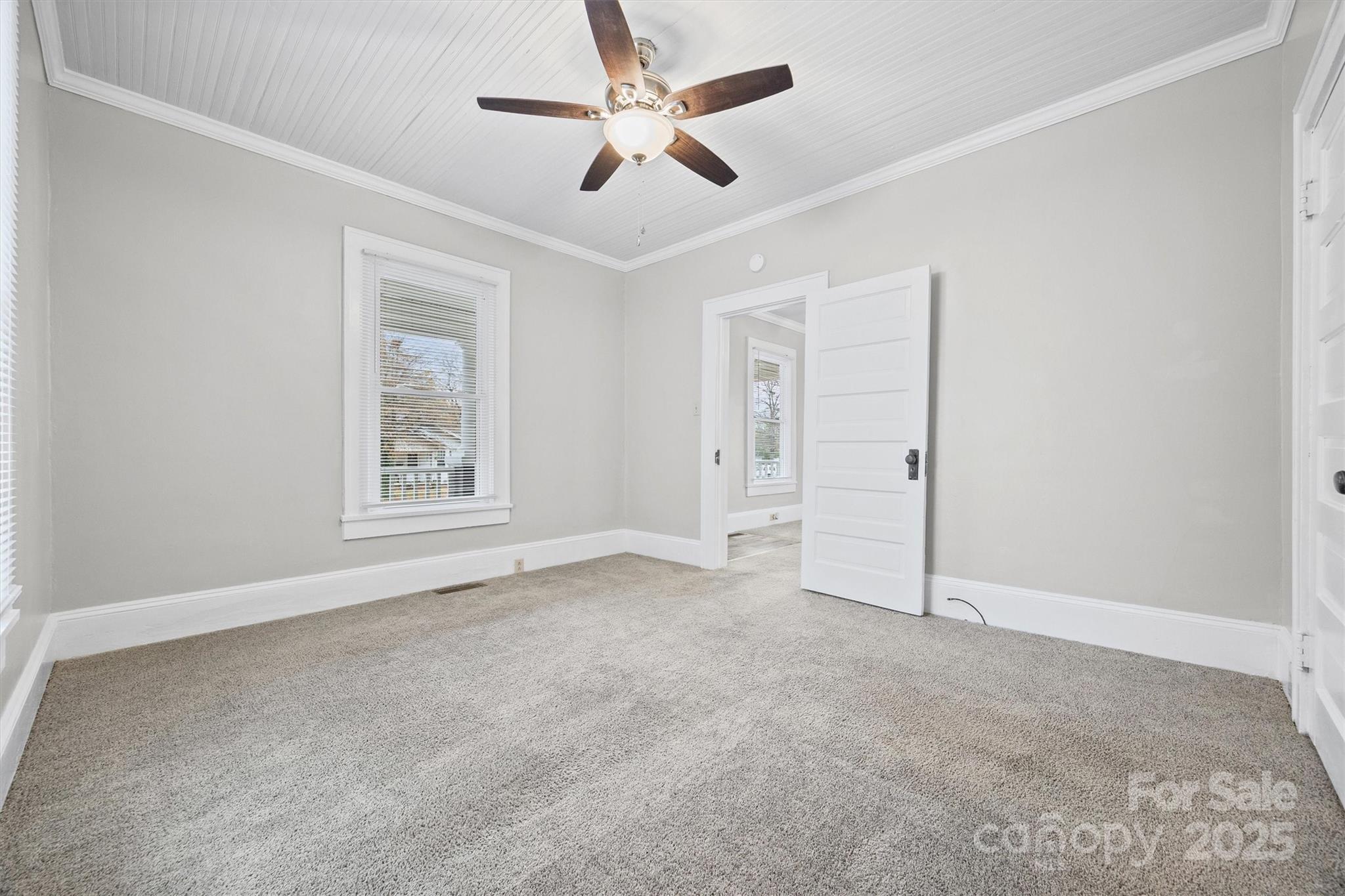 548 Flint Street Rock Hill, SC 29730 - Photo 20 of 28 an empty room with windows and fan