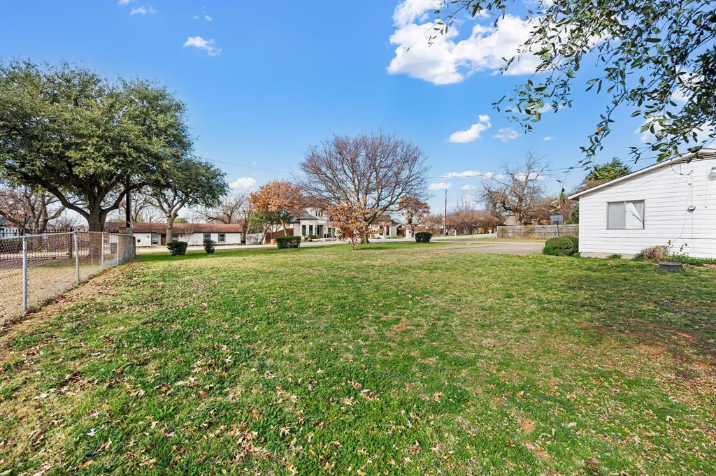 6701 Herbert Road Colleyville, TX 76034 - Photo 11 of 22 a view of yard with outdoor seating and green space