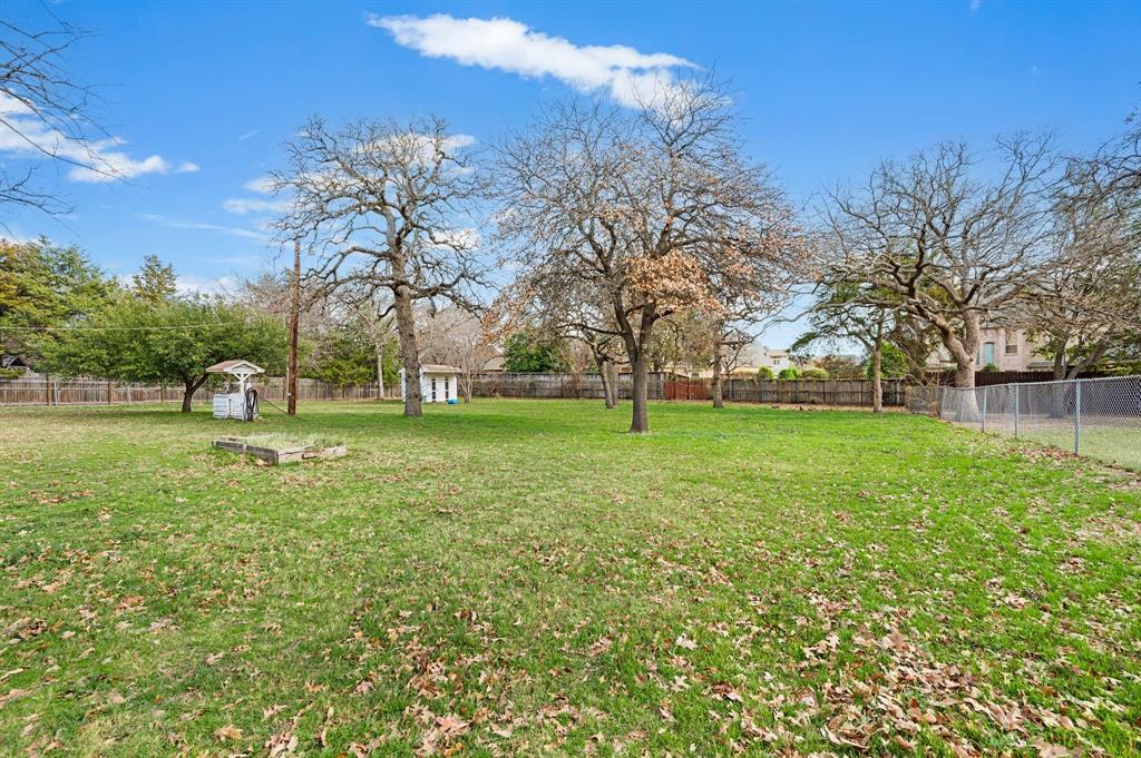 6701 Herbert Road Colleyville, TX 76034 - Photo 13 of 22 a view of a park with large trees