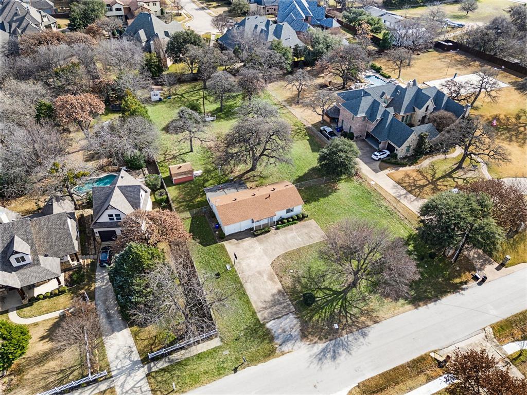 6701 Herbert Road Colleyville, TX 76034 - Photo 3 of 22 an aerial view of residential house with outdoor space