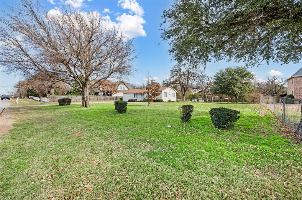 6701 Herbert Road Colleyville, TX 76034 - Photo 10 of 22 a view of a garden with an outdoor space