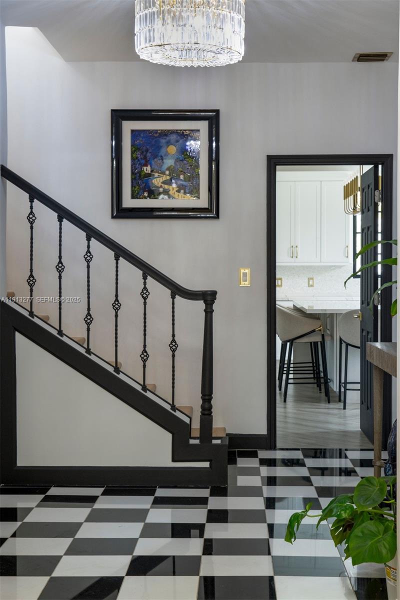 5149 Alton Road Miami Beach, FL 33140 - Photo 19 of 39 Elegant Foyer entrance