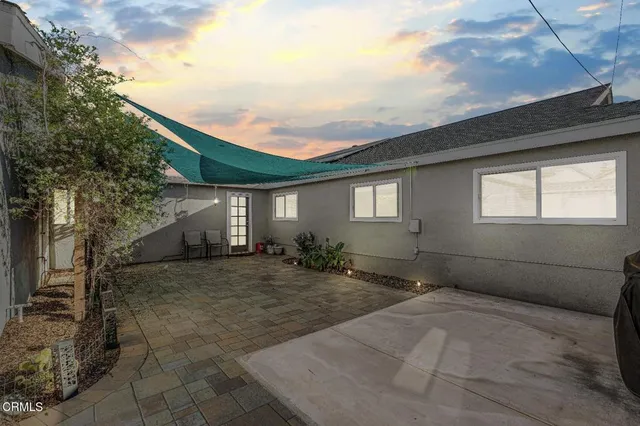 a backyard of a house with lots of green space