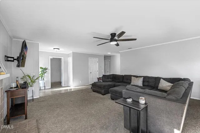 a living room with furniture a fireplace