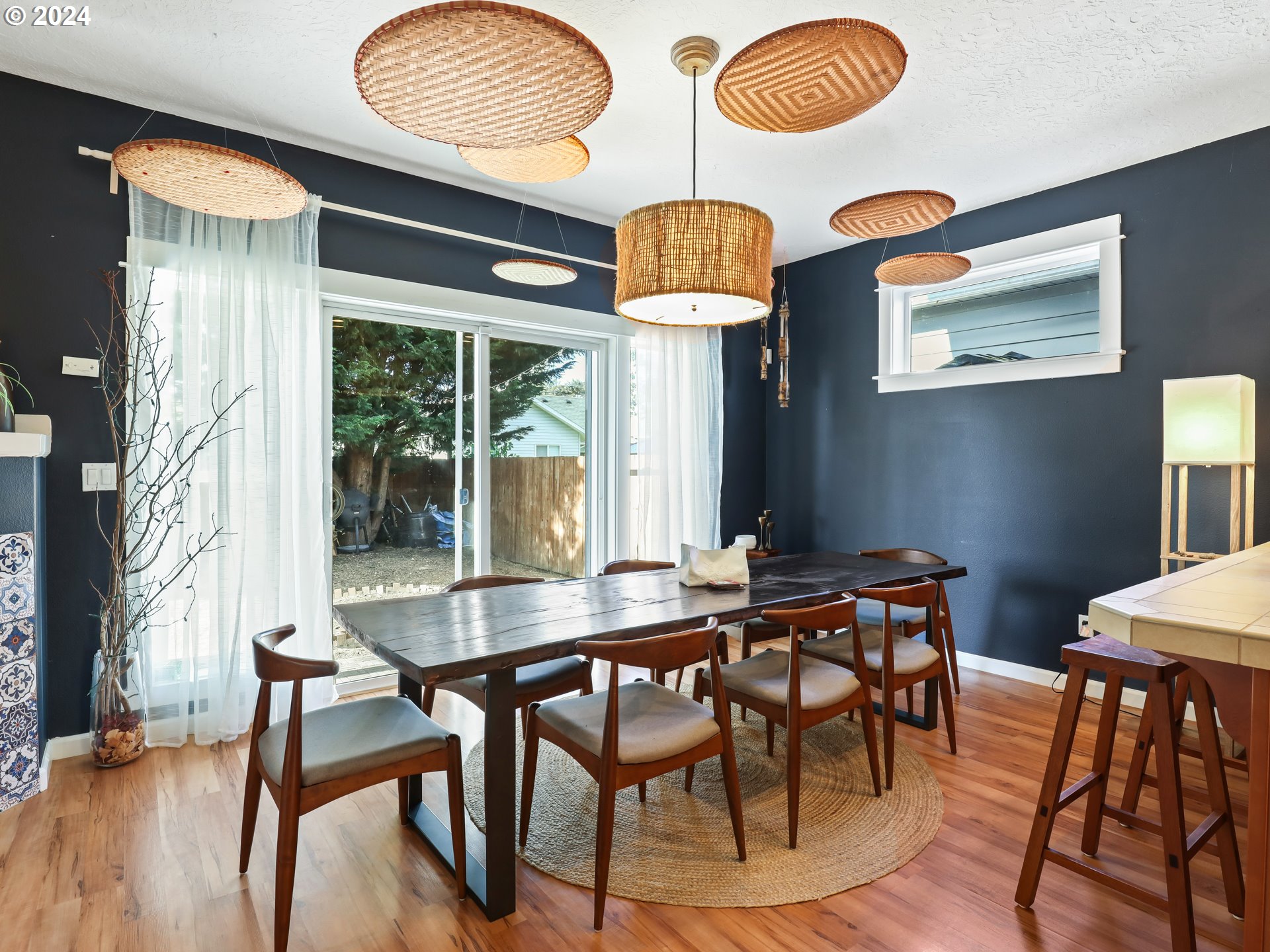 6924 Southeast Boise Street Portland, OR 97206 - Photo 14 of 45 a table and chairs in a room
