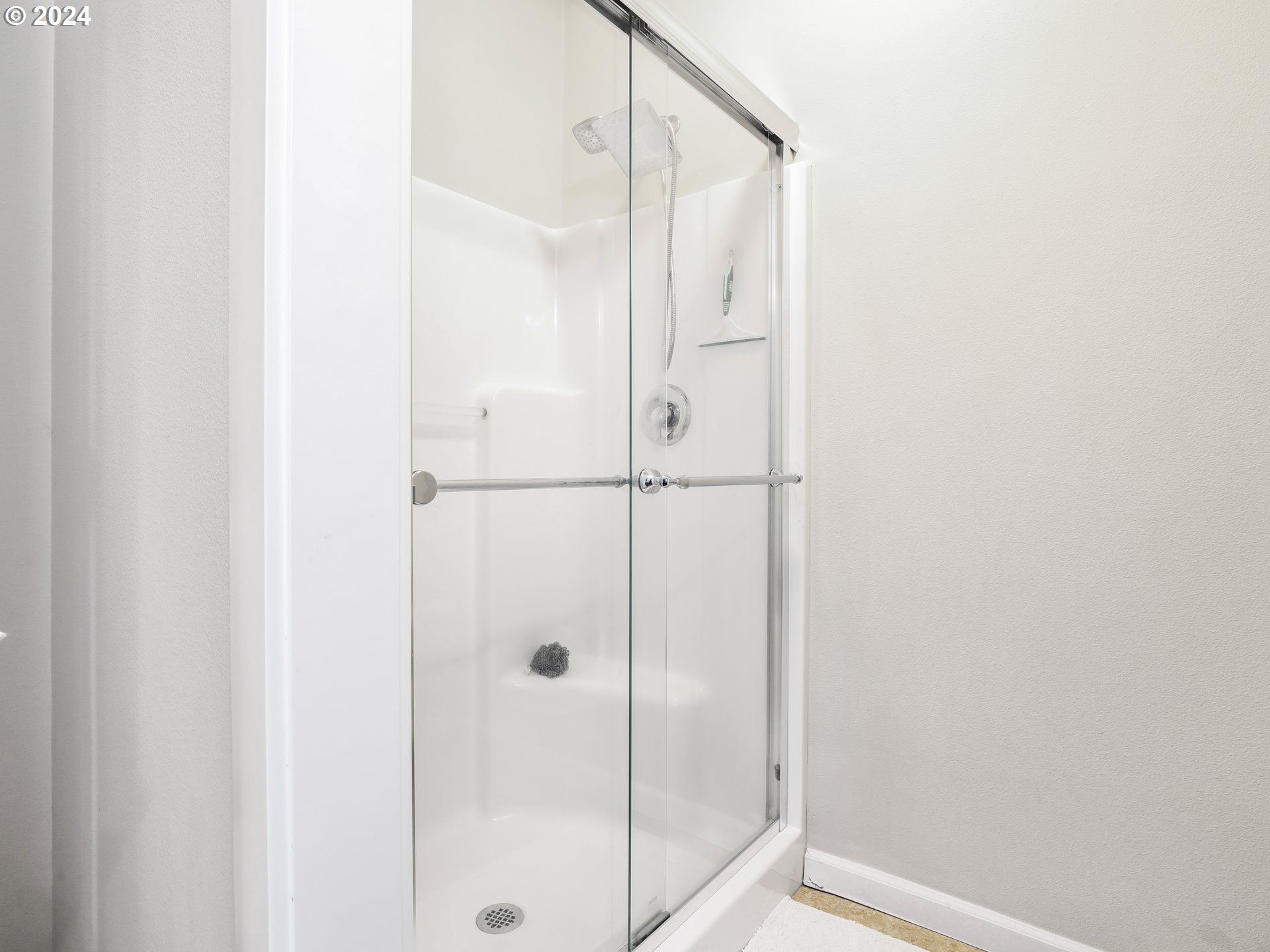 6924 Southeast Boise Street Portland, OR 97206 - Photo 30 of 45 a bathroom with a shower