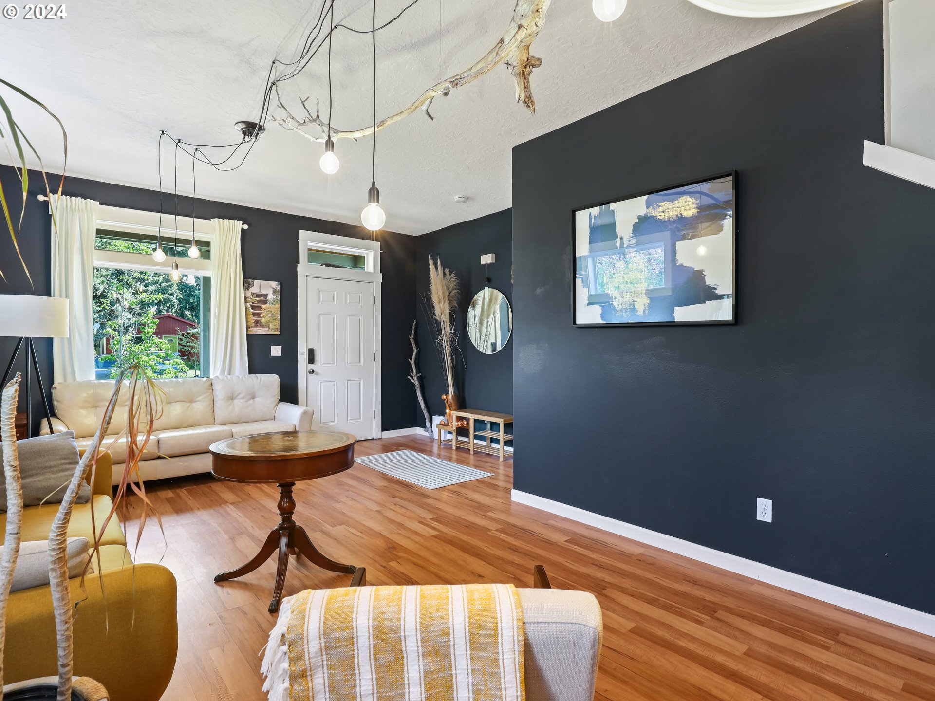 6924 Southeast Boise Street Portland, OR 97206 - Photo 5 of 45 a outdoor space with furniture