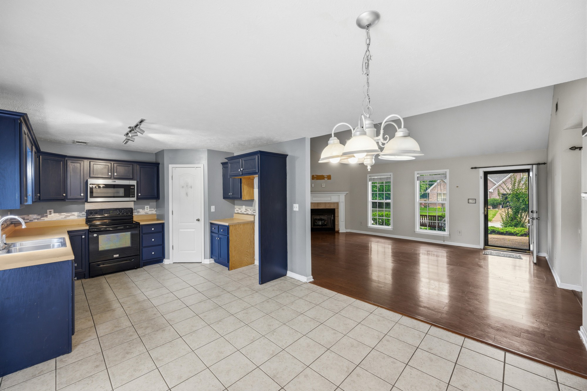270 Reed Circle Medina, TN 38355 - Photo 14 of 30 a view of a kitchen with furniture wooden floor and a window