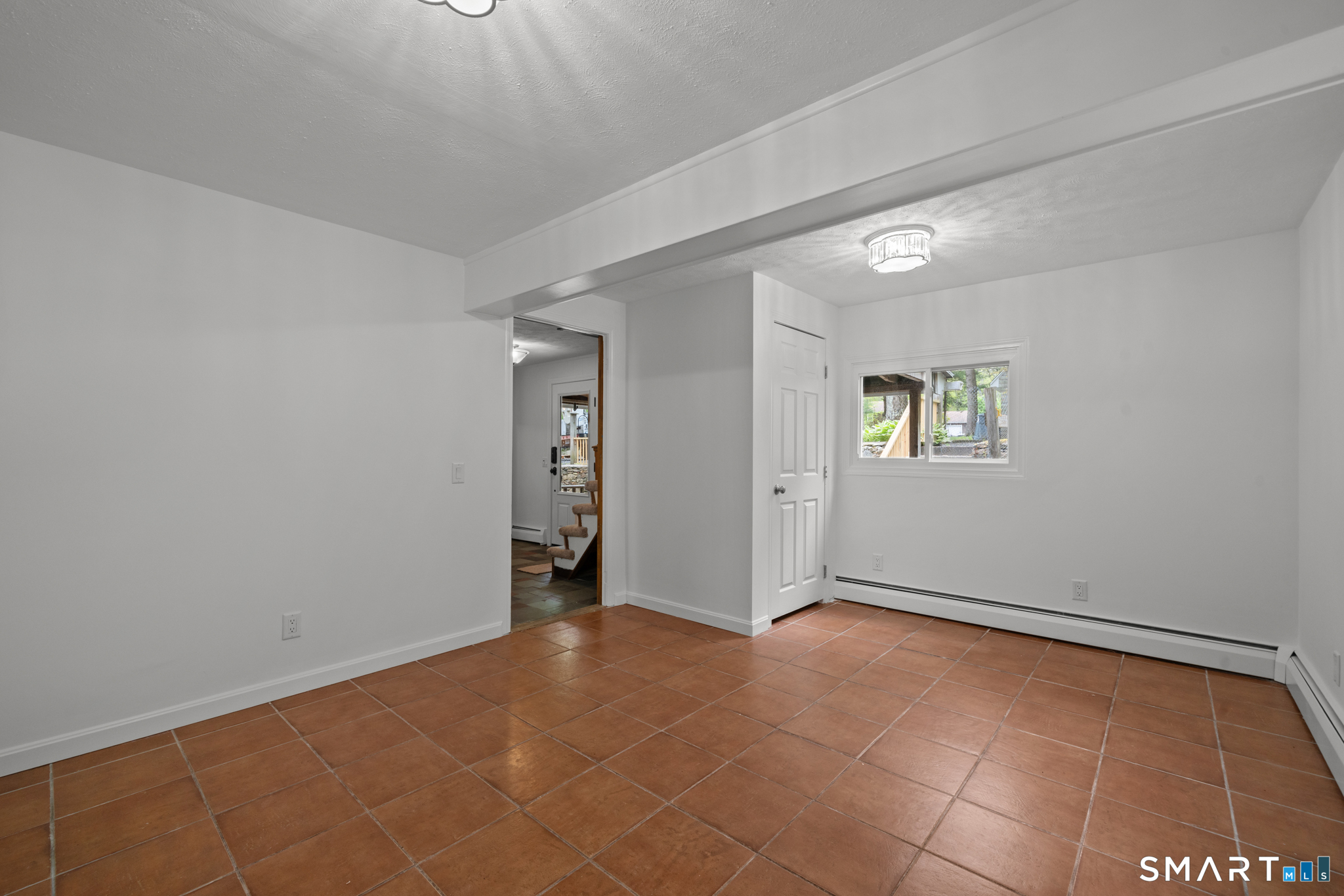 343 Hope Furnace Road Hope, RI 02831 - Photo 11 of 35 an empty room with windows and closet