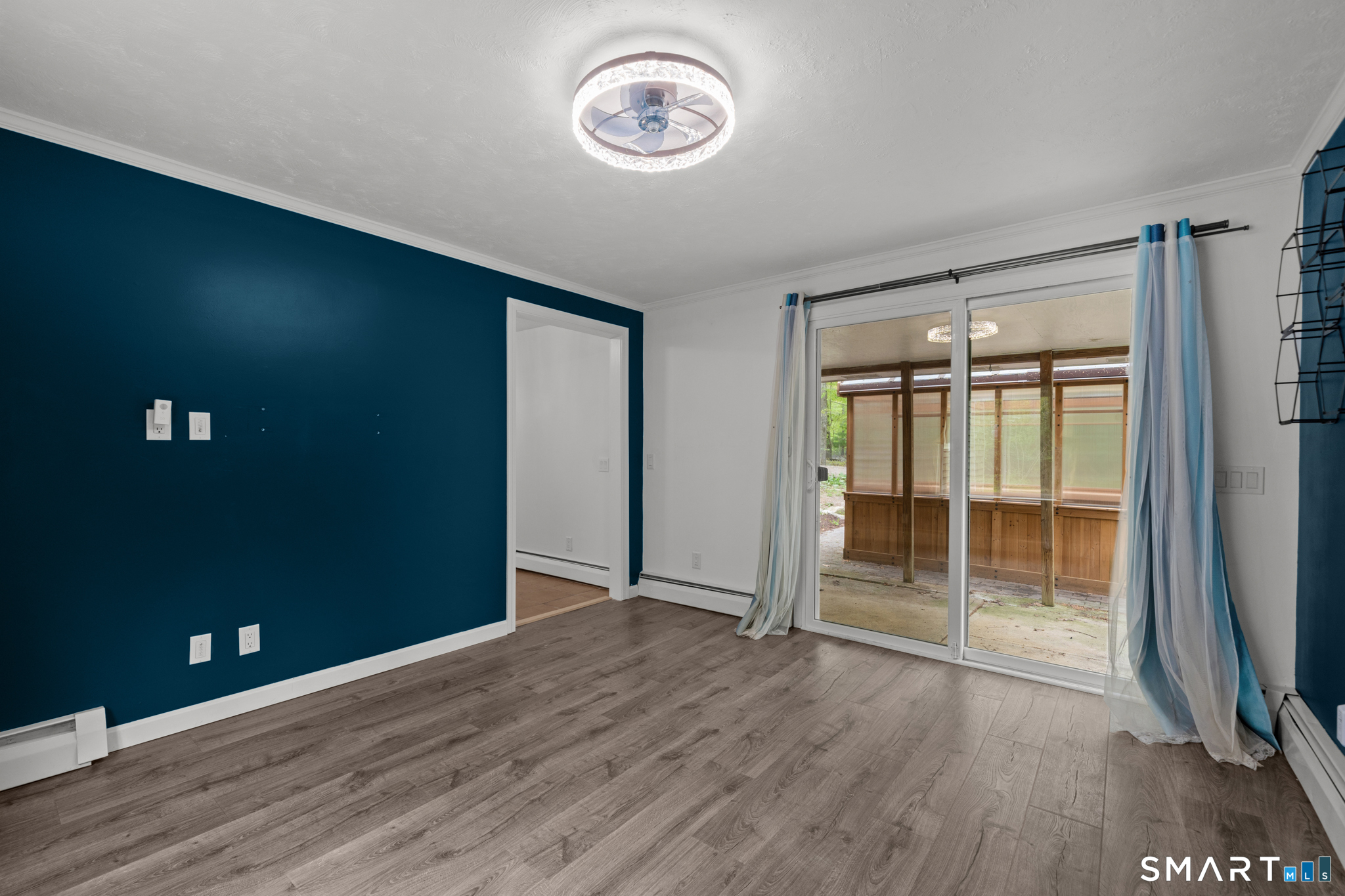 343 Hope Furnace Road Hope, RI 02831 - Photo 15 of 35 an empty room with wooden floor and windows