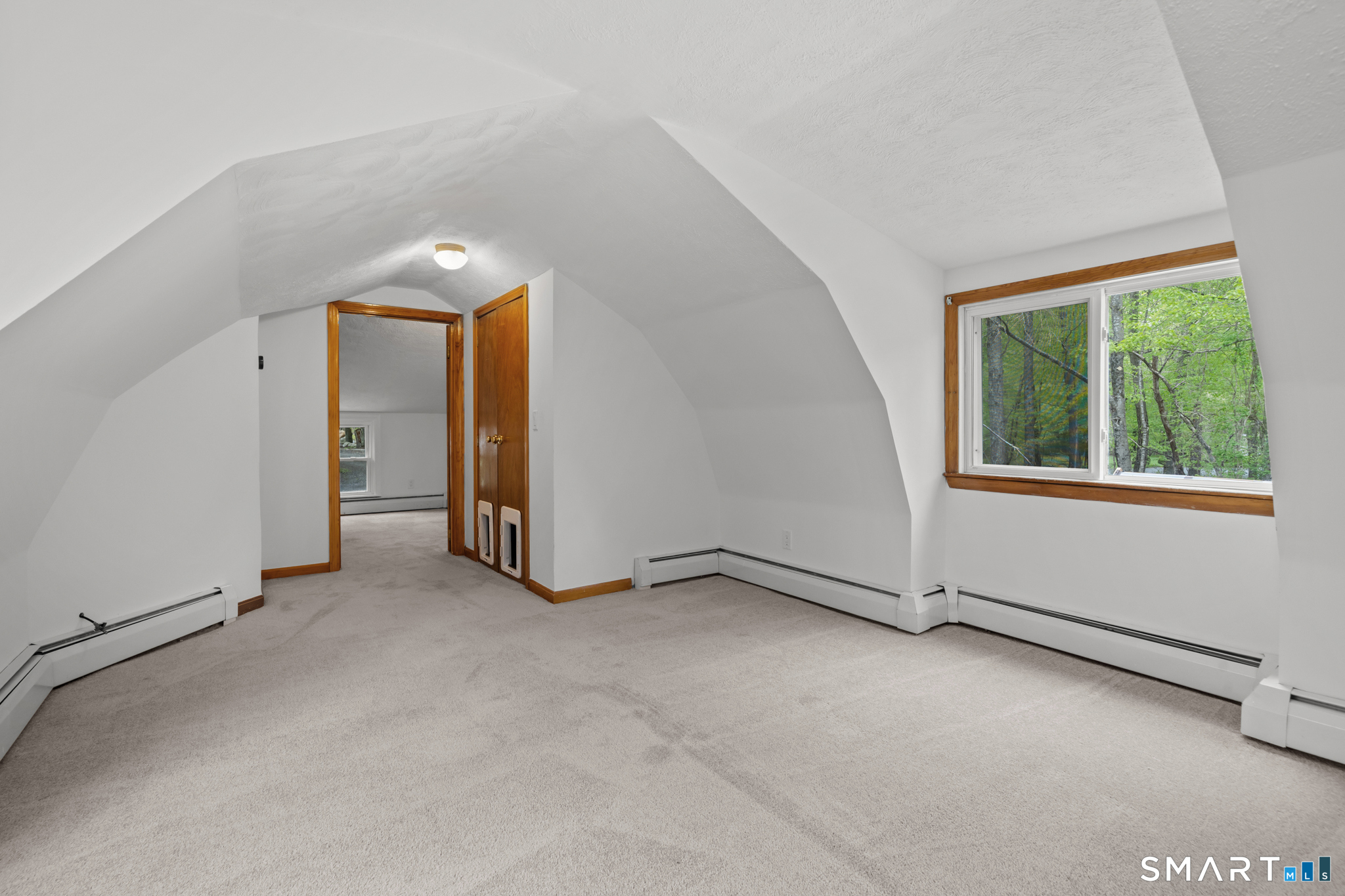 343 Hope Furnace Road Hope, RI 02831 - Photo 22 of 35 an empty room with windows and closet