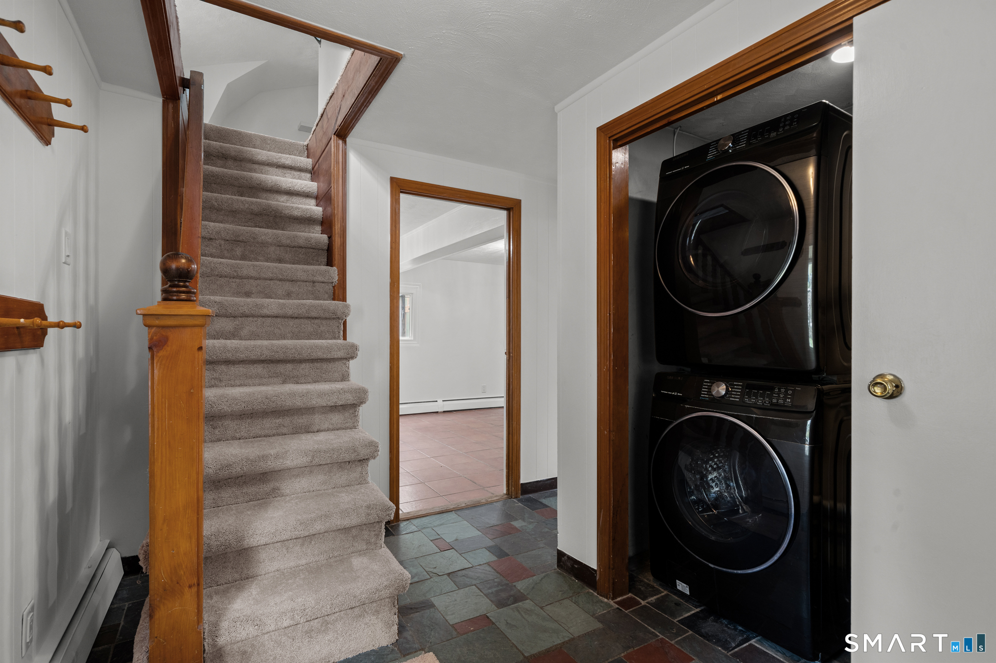 343 Hope Furnace Road Hope, RI 02831 - Photo 5 of 35 a view of a hallway with washer and dryer