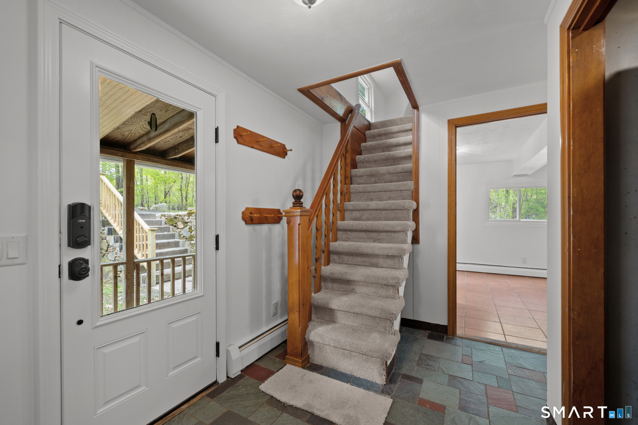 343 Hope Furnace Road Hope, RI 02831 - Photo 6 of 35 a view of entryway with wooden floor and windows
