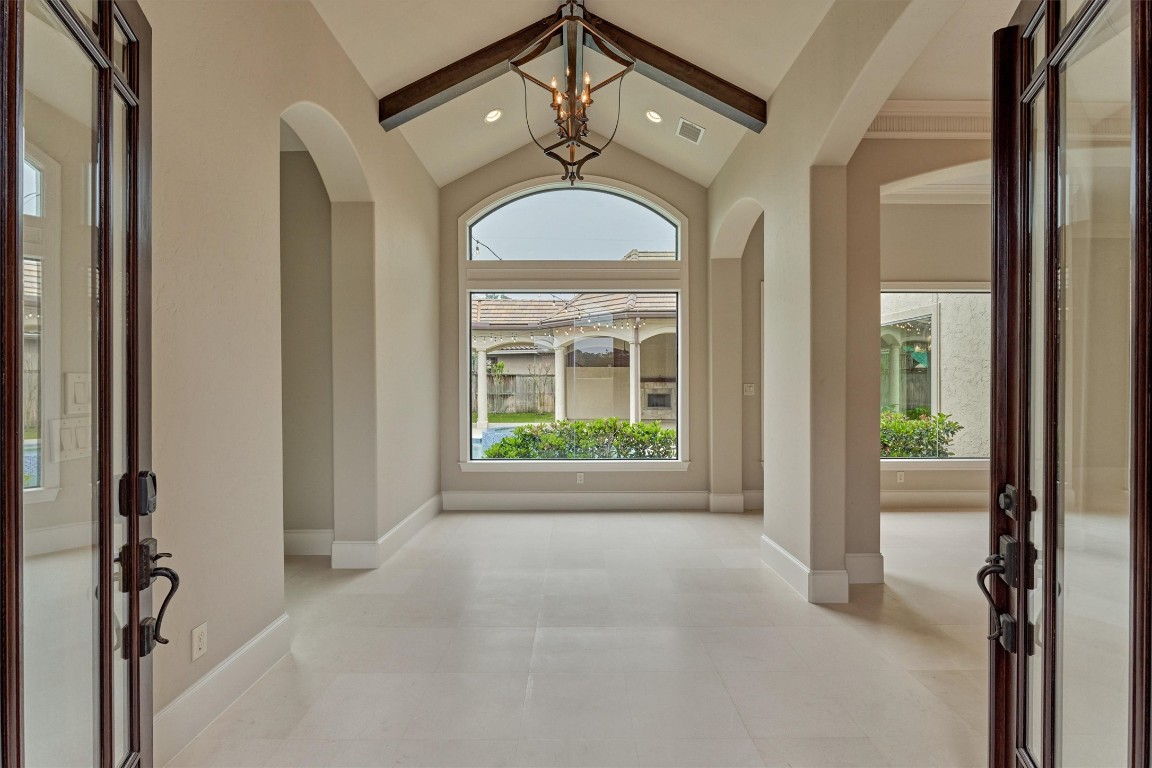25 Post Shadow Estate Drive Spring, TX 77389 - Photo 6 of 50 a view of a hallway with windows