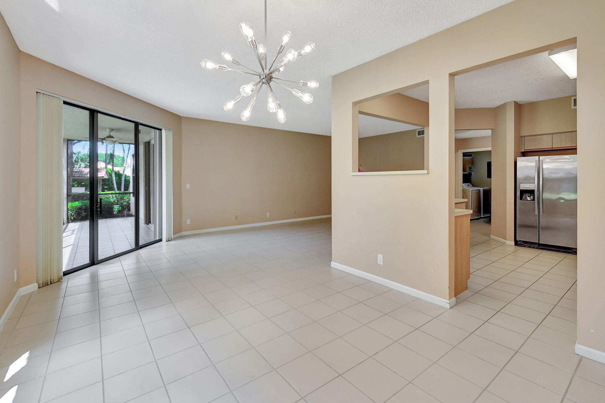 5770 Coach House Circle, Unit D Boca Raton, FL 33486 - Photo 18 of 52 DINING ROOM OFF KITCHEN