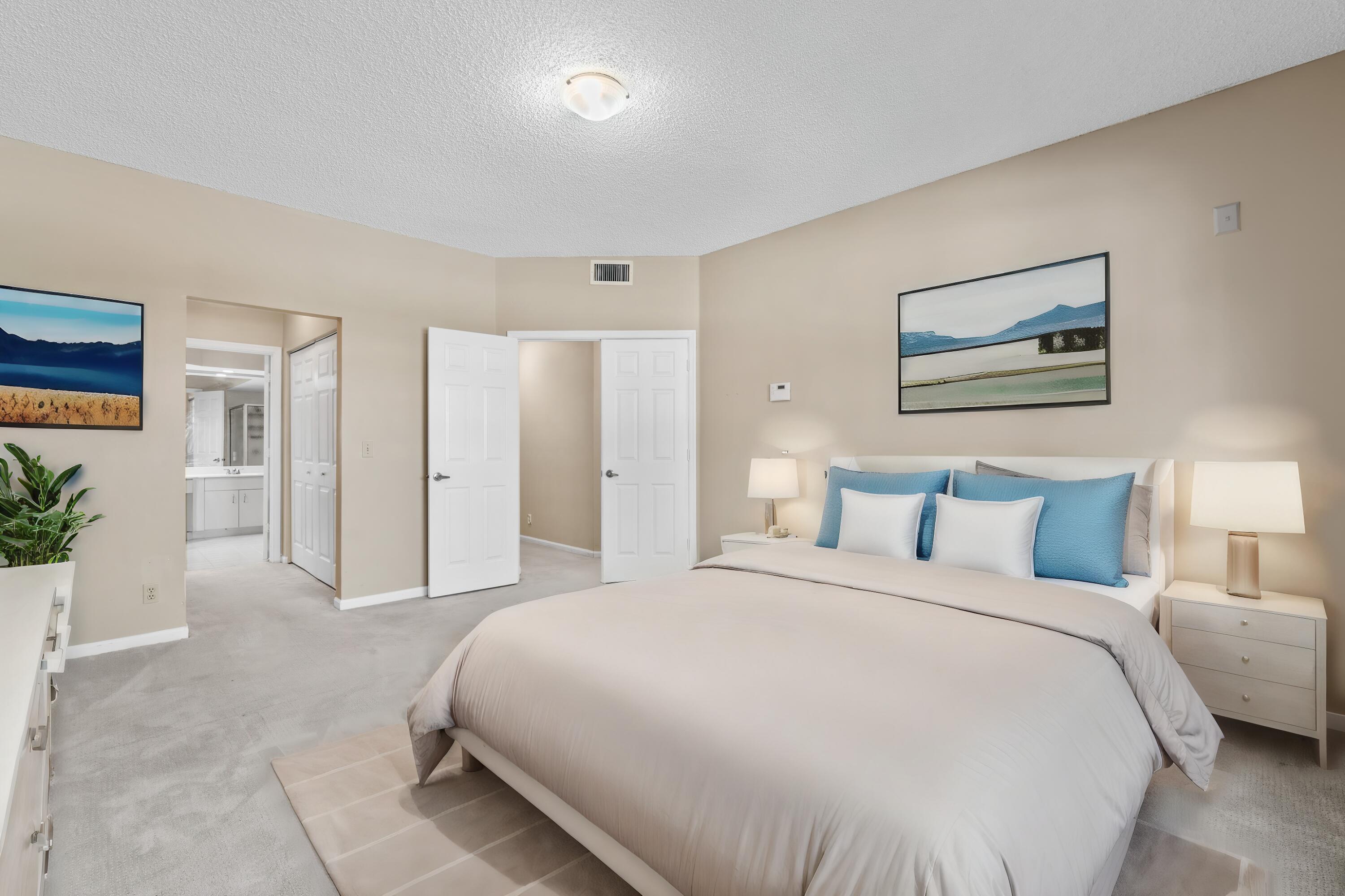 5770 Coach House Circle, Unit D Boca Raton, FL 33486 - Photo 23 of 52 STAGED PRIMARY SUITE