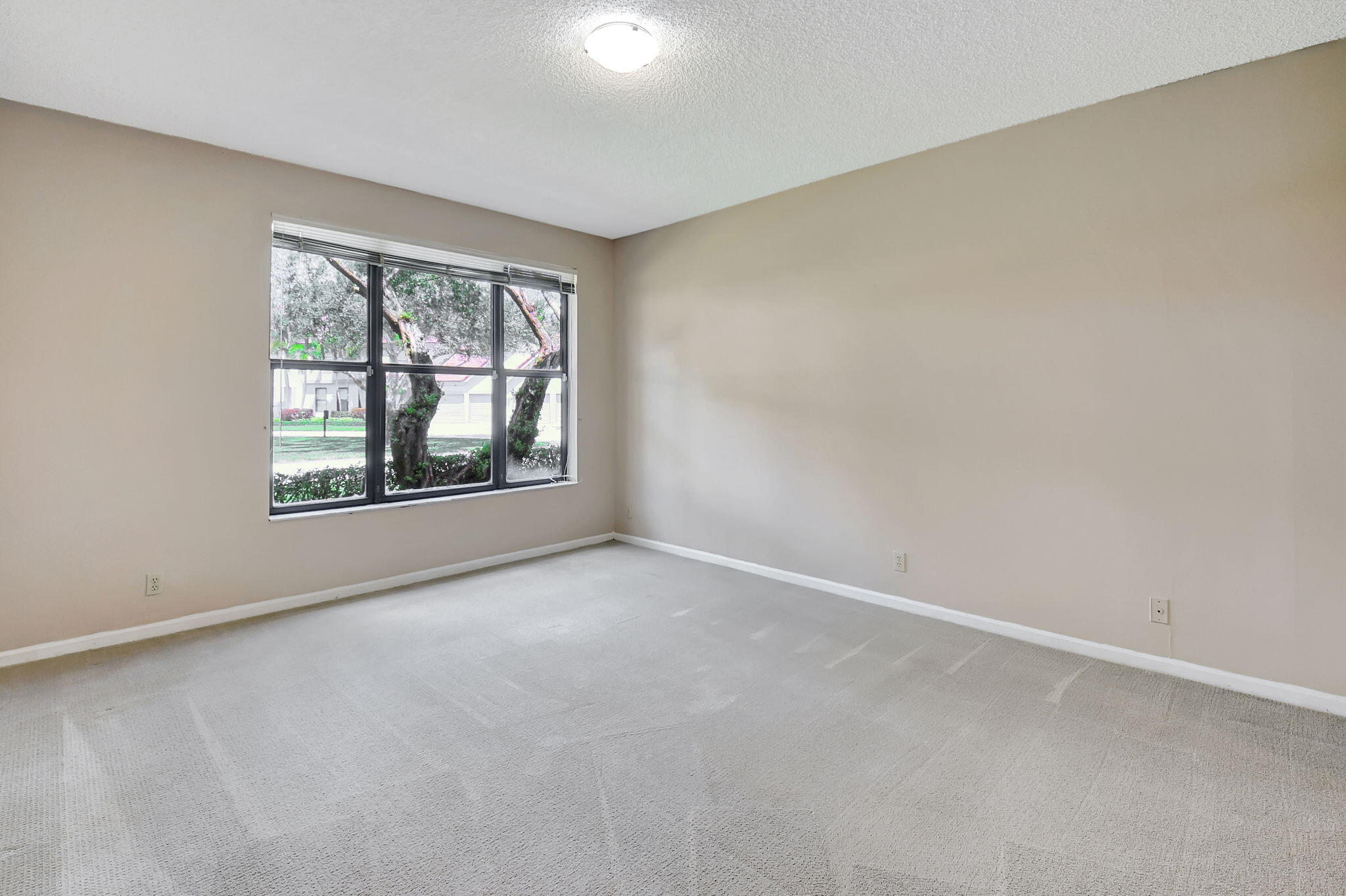 5770 Coach House Circle, Unit D Boca Raton, FL 33486 - Photo 25 of 52 PRIMARY WINDOW BRINGS THE SUN IN