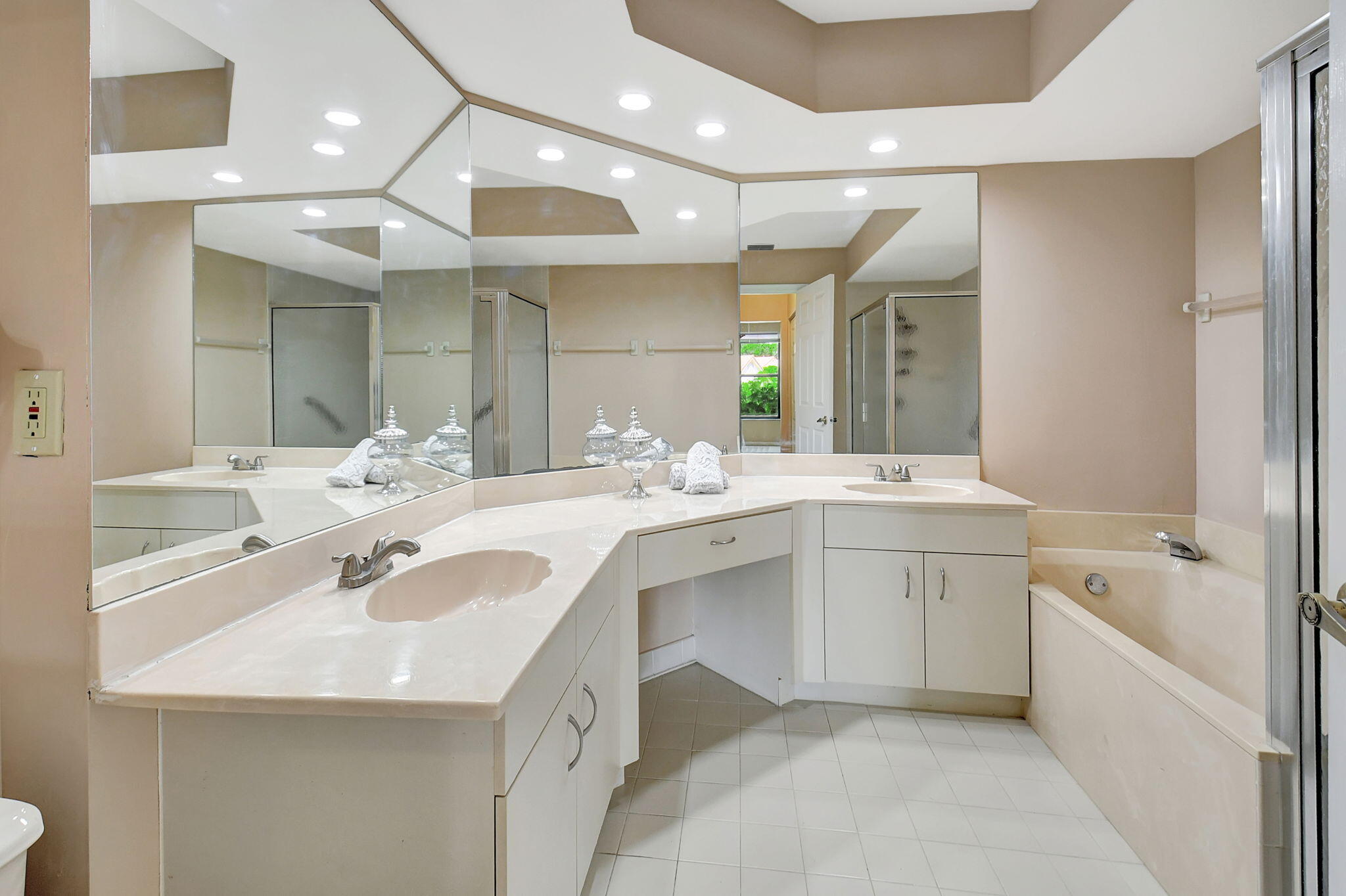 5770 Coach House Circle, Unit D Boca Raton, FL 33486 - Photo 27 of 52 PRIMARY BATH WITH DUAL SINK VANITY