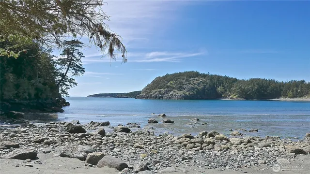 a view of a road with an ocean view
