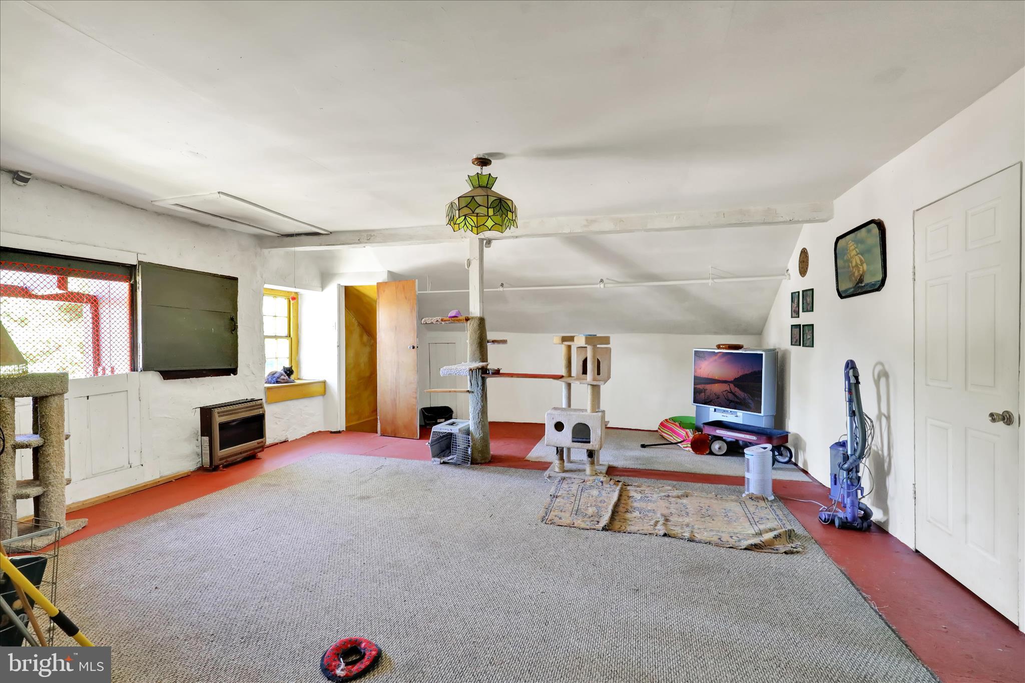 1524 Friedensburg Road Reading, PA 19606 - Photo 25 of 57 a bedroom with furniture and a flat screen tv